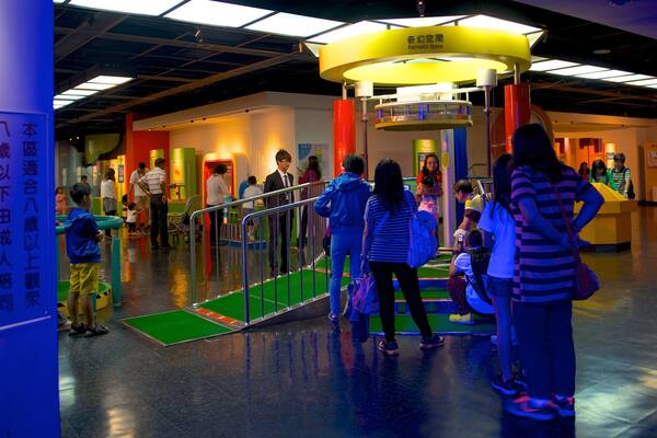 National Museum of Natural Science showing interior views as well as a small group of people