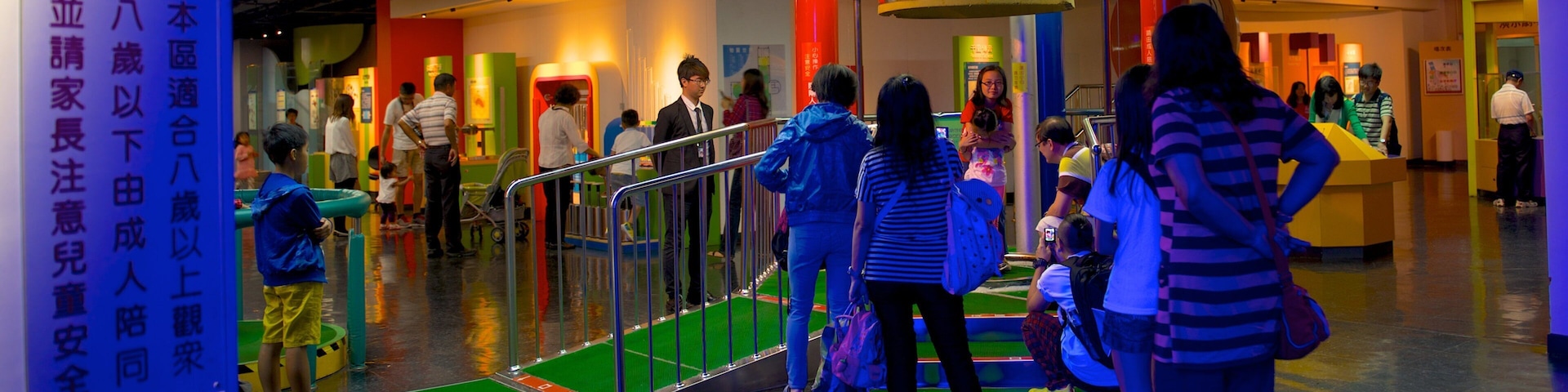 National Museum of Natural Science showing interior views as well as a small group of people