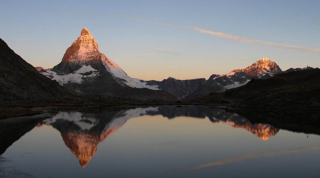 Matterhorn showing a lake or waterhole, a sunset and snow