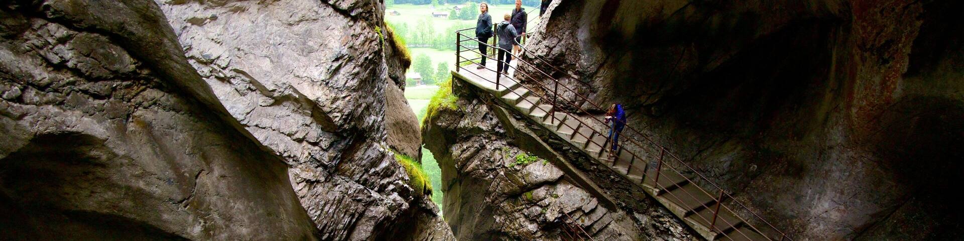 Trummelbach Falls featuring a cascade, a gorge or canyon and views
