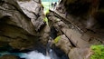 Trummelbach Falls featuring a cascade, a gorge or canyon and views
