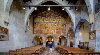 Santa Maria degli Angeli featuring a church or cathedral, religious aspects and interior views