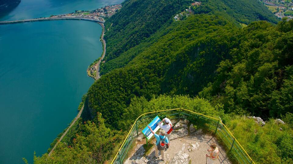 Monte San Salvatore showing views and a river or creek as well as a couple