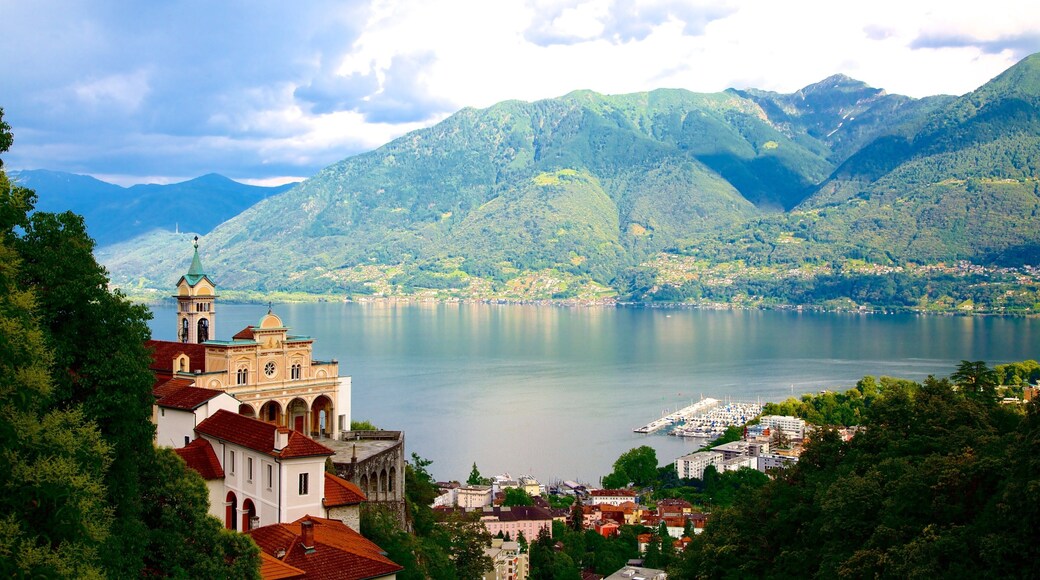 Madonna del Sasso which includes a lake or waterhole and a small town or village