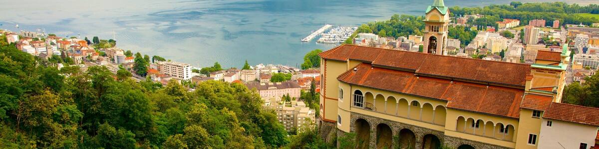 Madonna del Sasso which includes landscape views, a small town or village and a river or creek