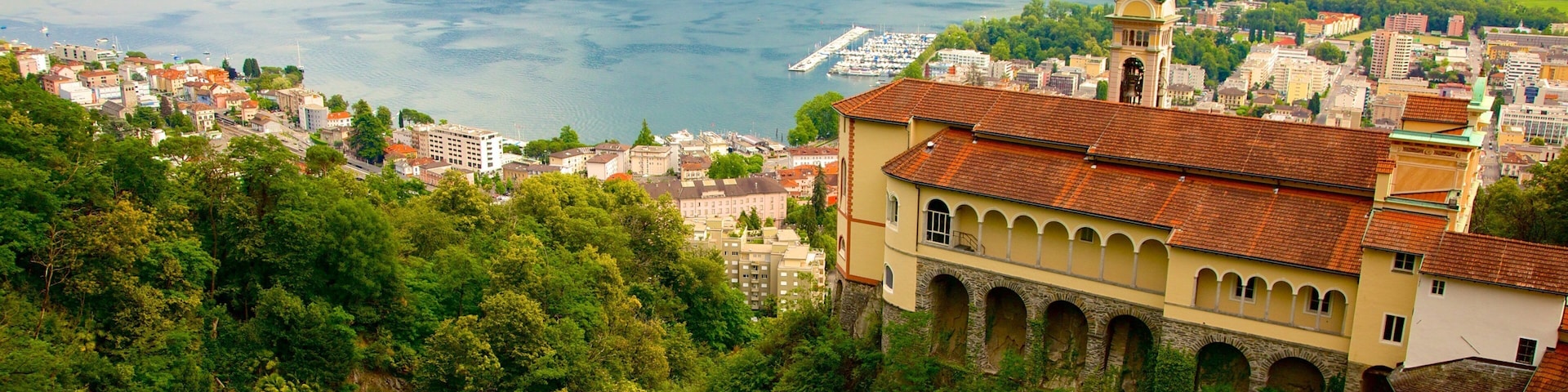 Madonna del Sasso which includes landscape views, a small town or village and a river or creek