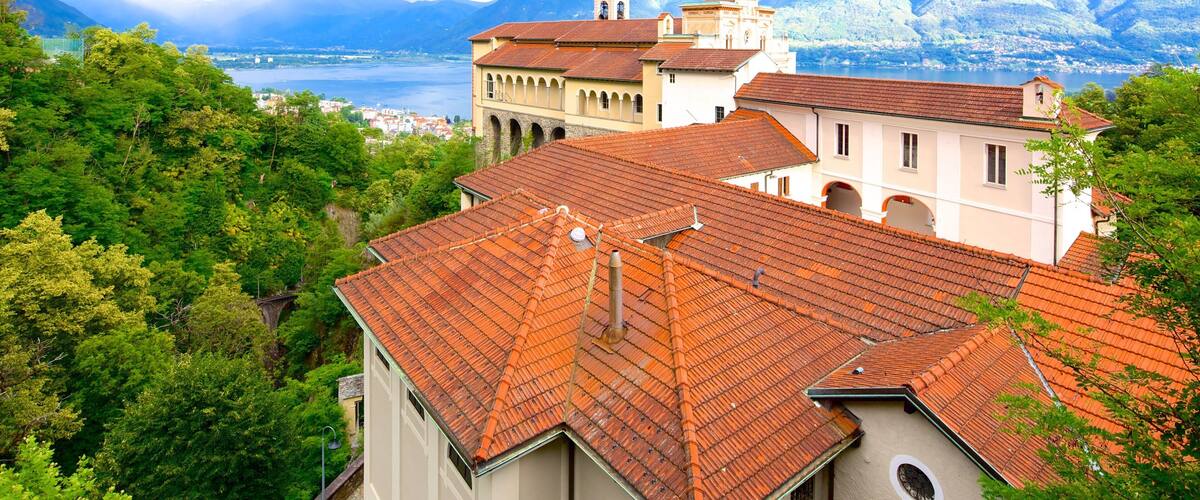 Madonna del Sasso featuring landscape views and a small town or village