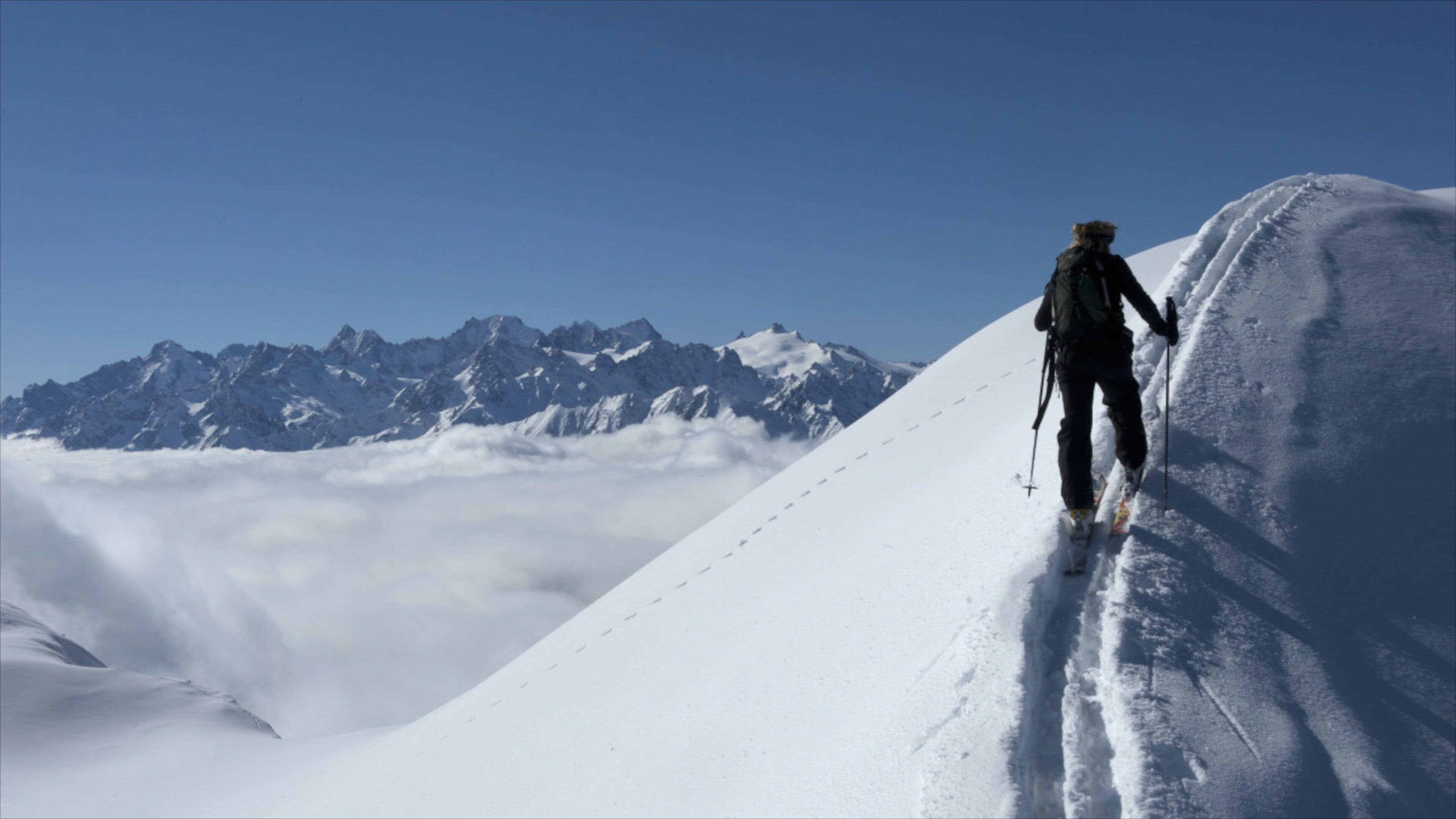 Verbier Ski Resort showing snow and snow skiing as well as an individual male