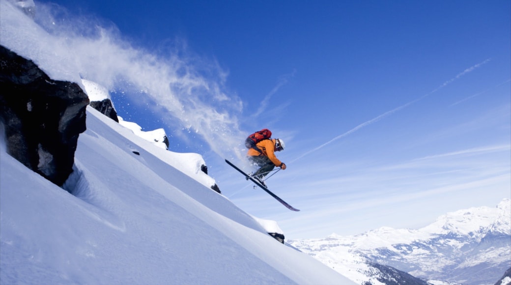 Verbier Ski Resort showing snow and cross country skiing as well as an individual male