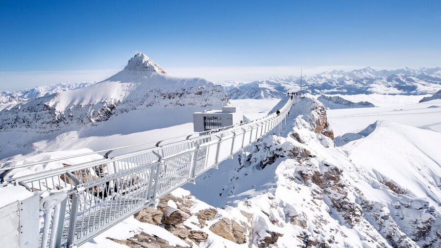 Gstaad Ski Resort featuring mountains and snow