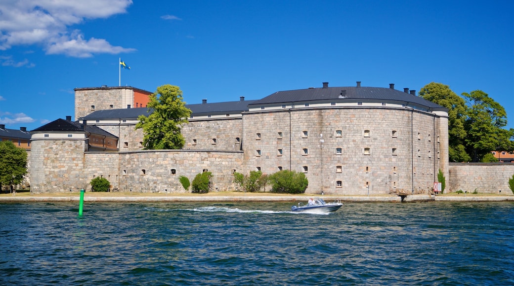 Vaxholm Fortress which includes a castle, a bay or harbor and boating