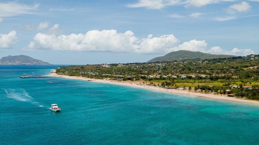 Pinney\'s Beach featuring boating, general coastal views and a coastal town