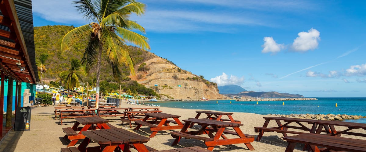 Frigate Bay Beach which includes general coastal views, tropical scenes and a sandy beach