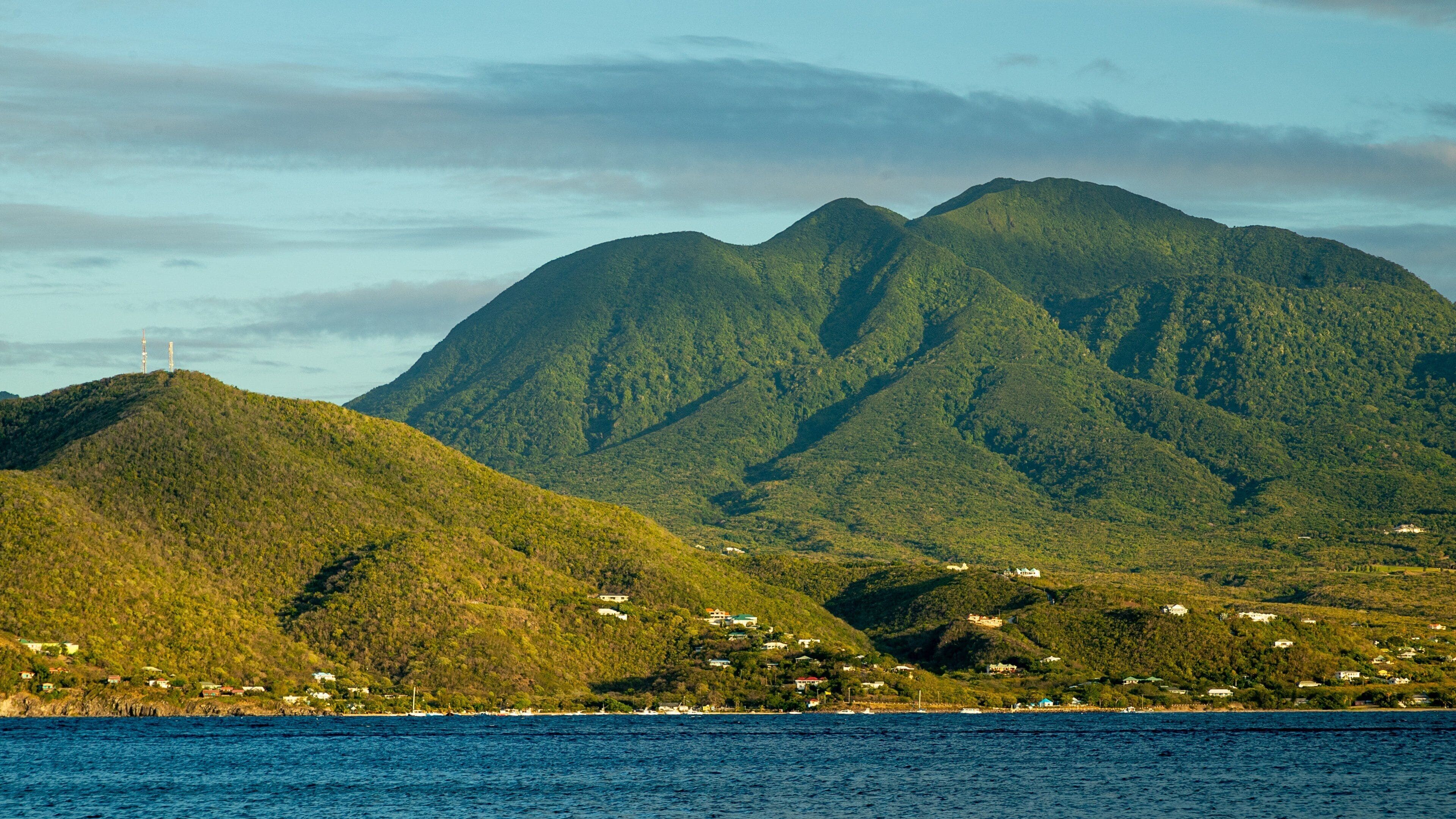 Cockleshell Bay which includes tranquil scenes, mountains and general coastal views