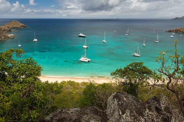 Colombier Beach which includes landscape views, a bay or harbor and general coastal views