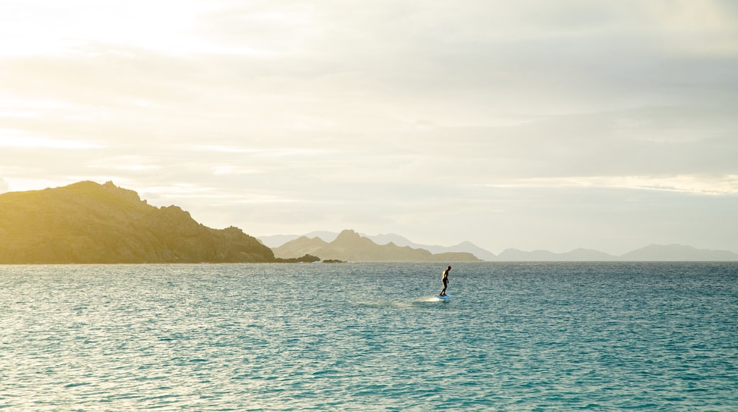 Flamands Beach featuring a sunset and general coastal views