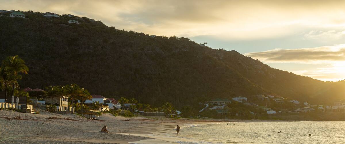 Flamands Beach featuring a sandy beach, a sunset and general coastal views