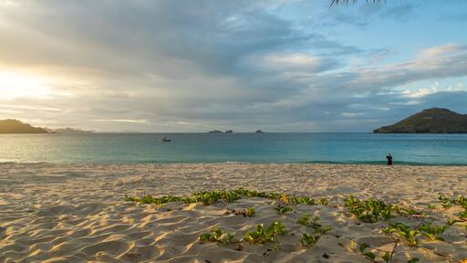 Flamands Beach showing a sandy beach, a sunset and general coastal views