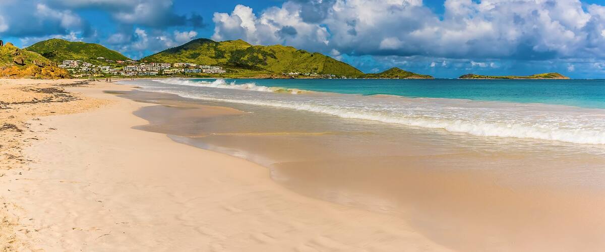 A view along Orient beach in St Martin towards the headland