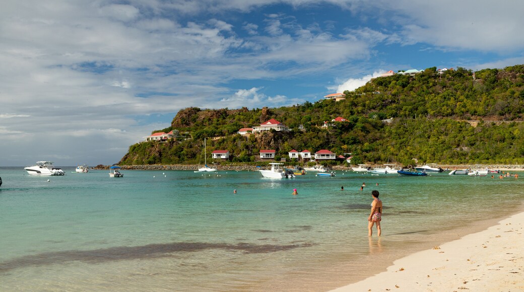 St. Jean Beach showing a coastal town, general coastal views and swimming
