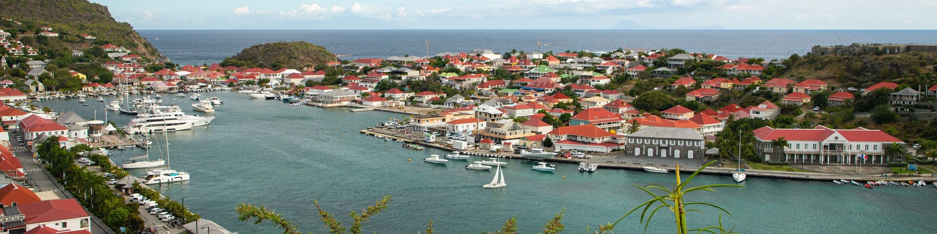 Gustavia Harbor which includes general coastal views, a coastal town and a bay or harbor