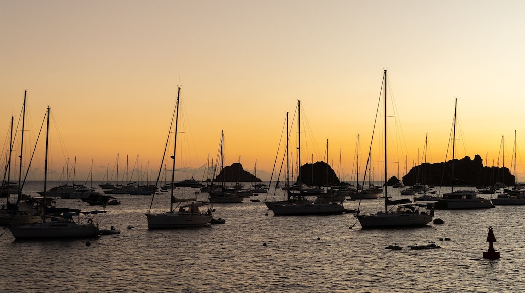 Gustavia Harbor which includes a sunset, general coastal views and a bay or harbor