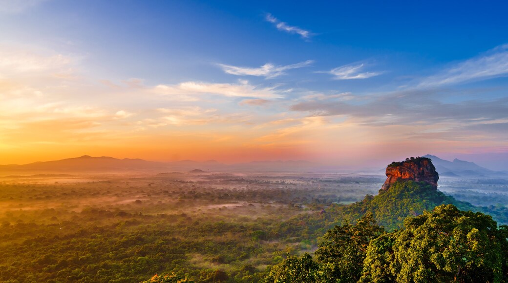 Sunrise view to Sigiriya rock - Lion Rock - from Pidurangala Rock in Sri Lanka