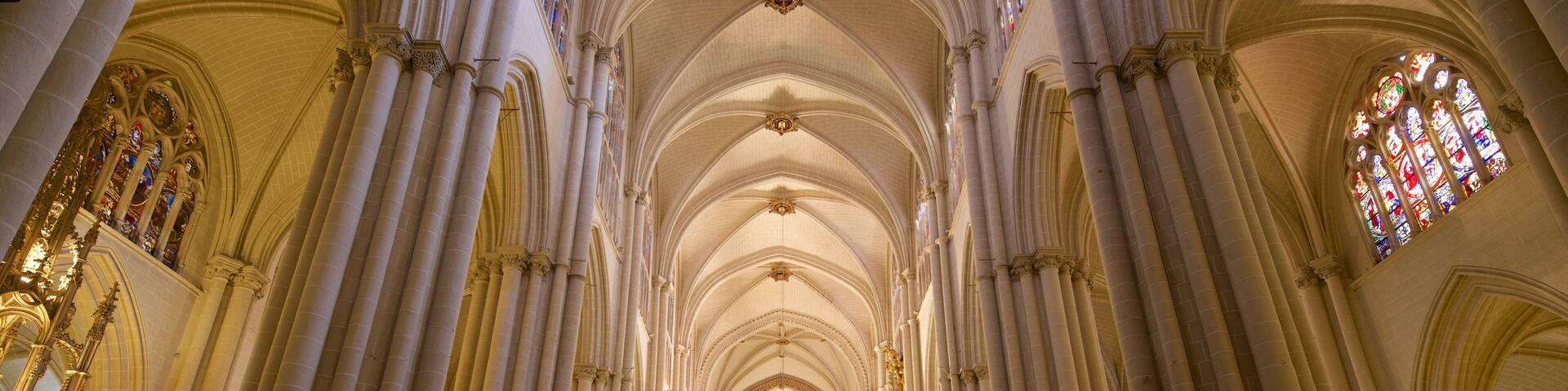 Toledo Cathedral which includes heritage elements, a church or cathedral and interior views