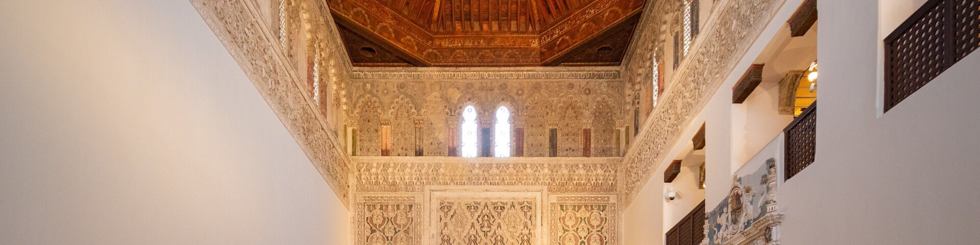 Synagogue of El Transito featuring interior views and heritage elements