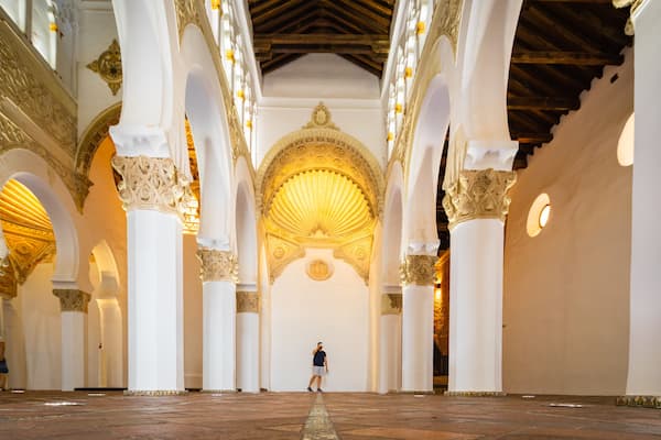 Synagogue of Saint Mary the White featuring interior views and heritage elements as well as an individual male