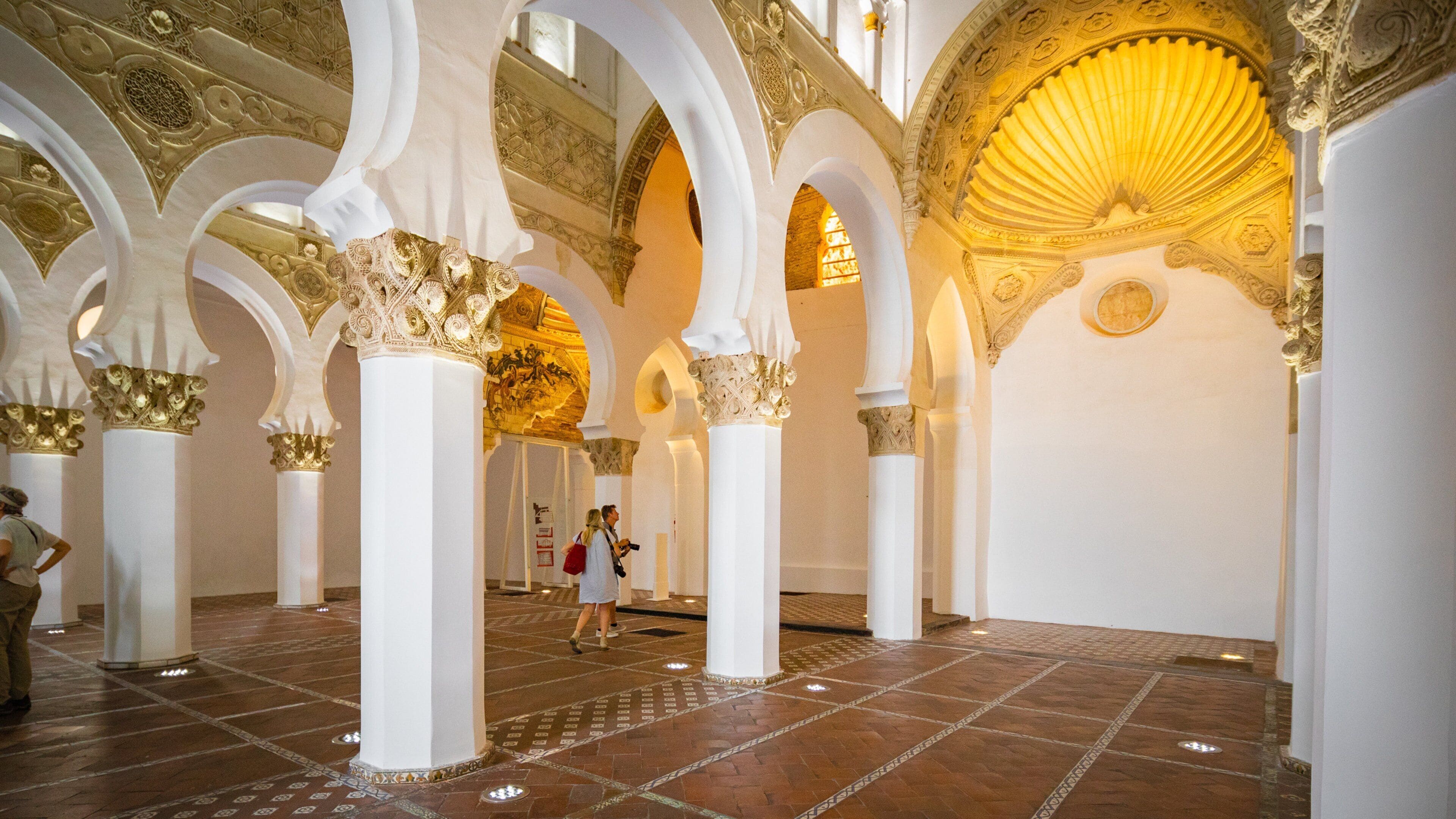 Synagogue of Saint Mary the White featuring heritage elements and interior views