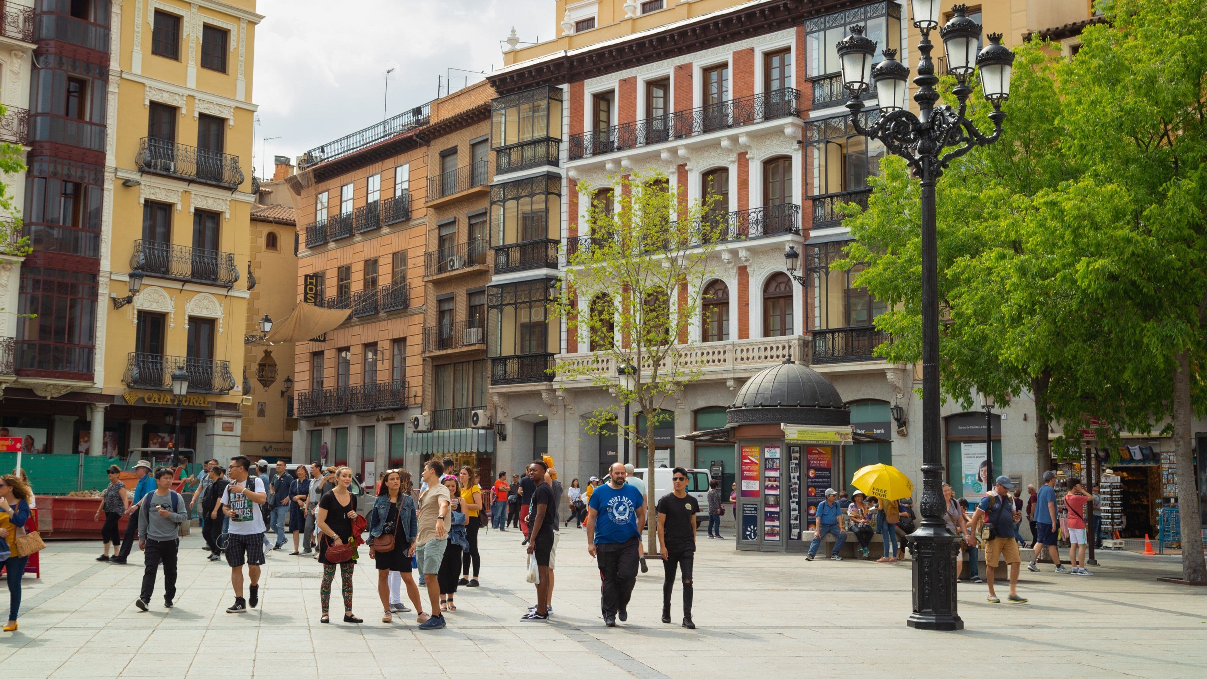 Plaza de Zocodover featuring a square or plaza and street scenes as well as a small group of people