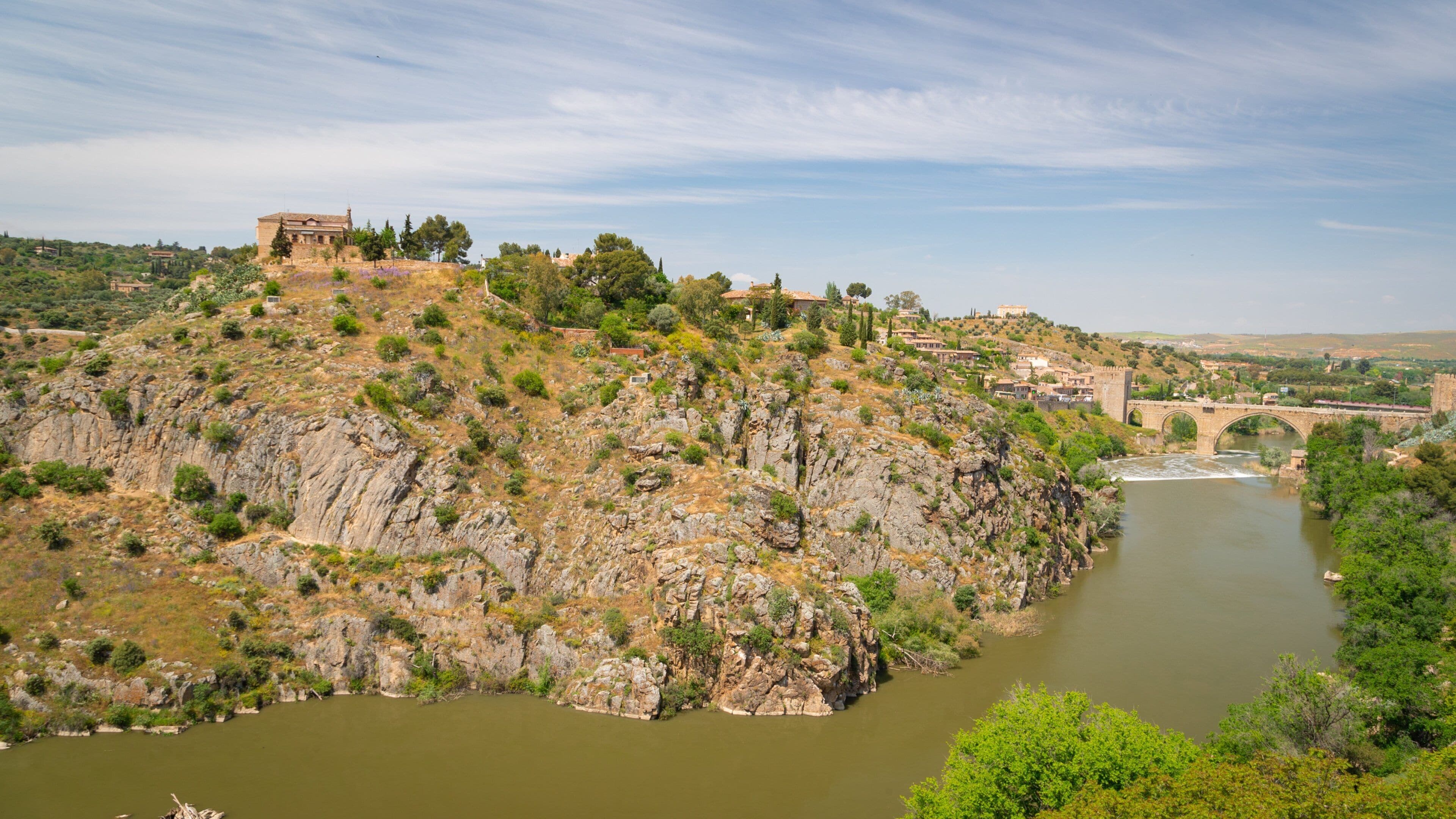 San Martin Bridge which includes landscape views and a river or creek