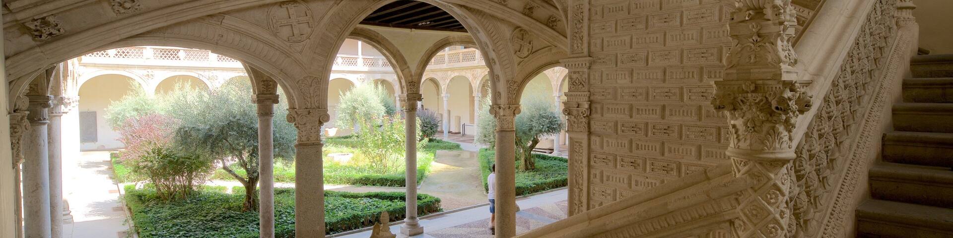 An ornate architectural structure with intricate carvings and a central courtyard.