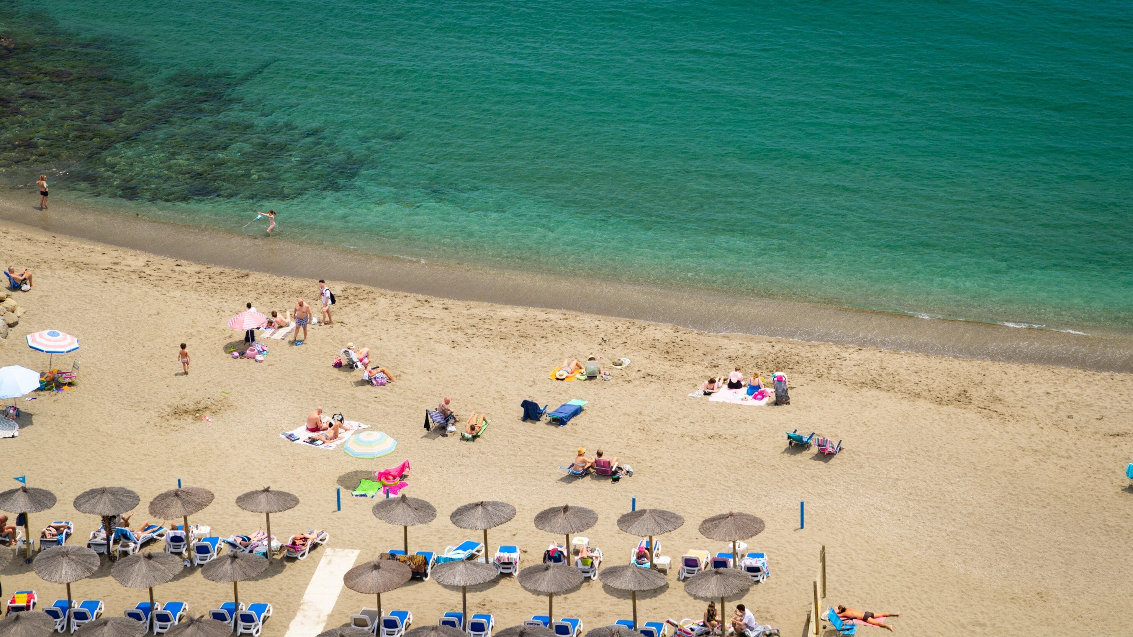 Fuengirola Beach which includes general coastal views and a sandy beach