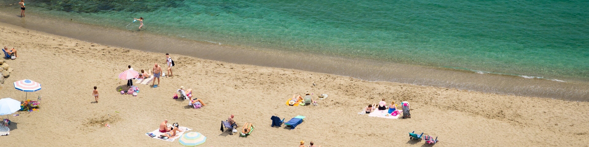 Fuengirola Beach which includes general coastal views and a sandy beach