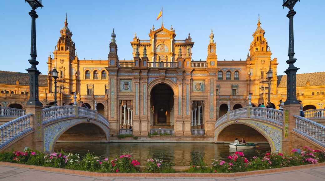 Plaza de Espana featuring a sunset, heritage architecture and a bridge