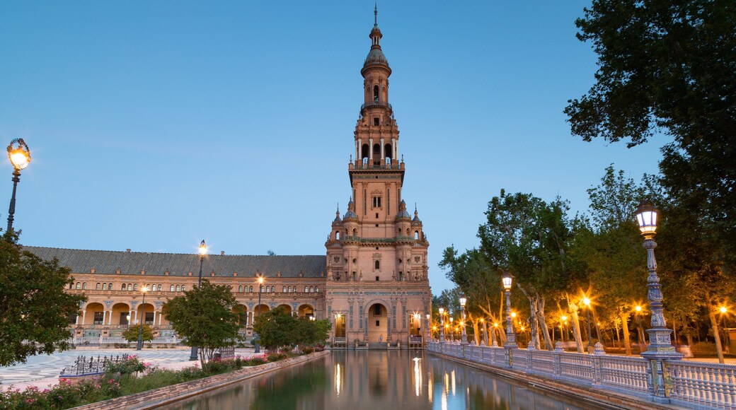 Plaza de Espana which includes a river or creek and heritage architecture