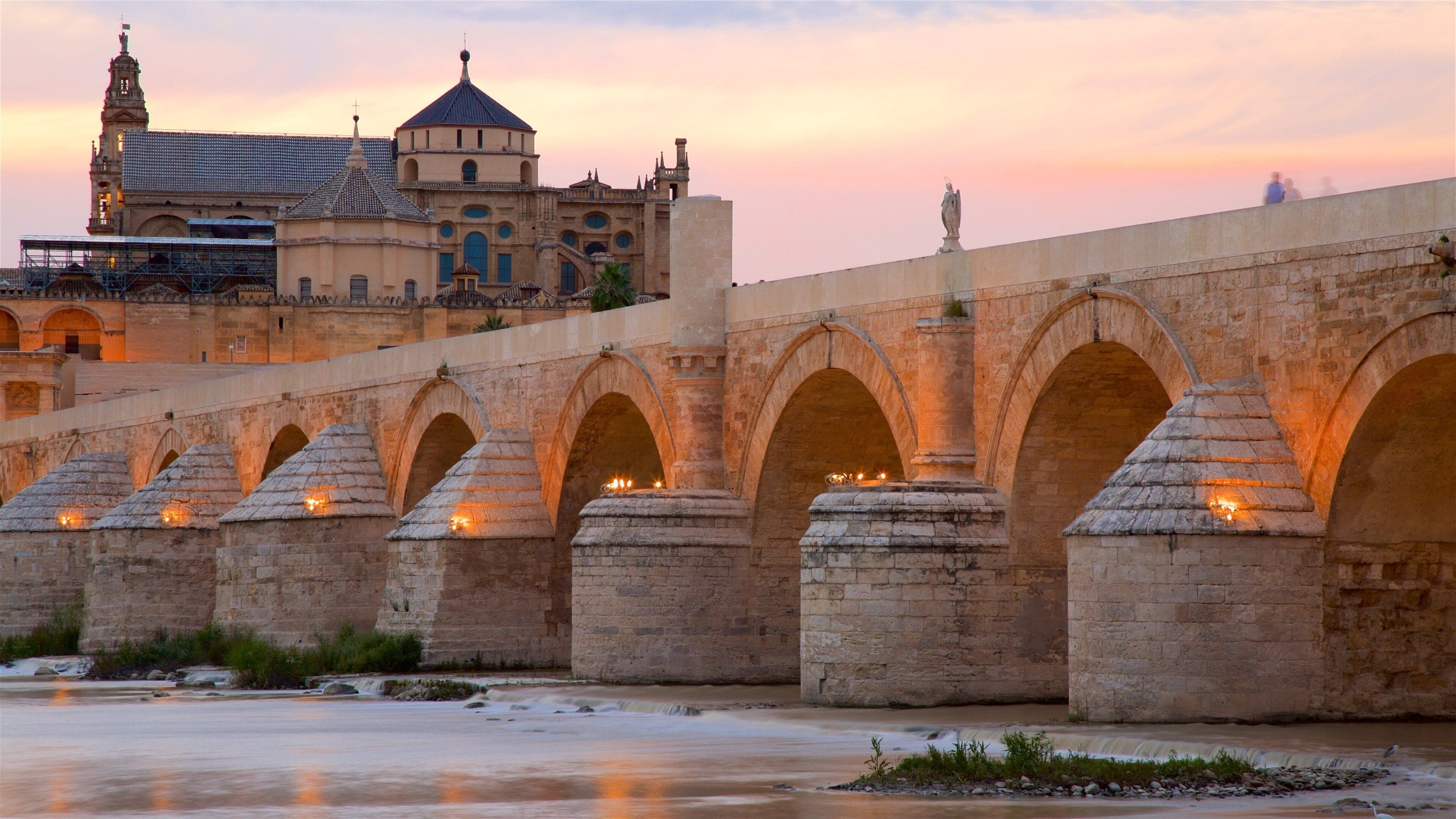 Roman Bridge showing a bridge, heritage elements and a river or creek