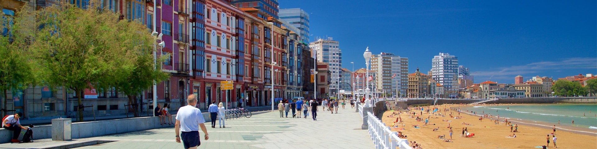 San Lorenzo Beach featuring a coastal town, hiking or walking and a city