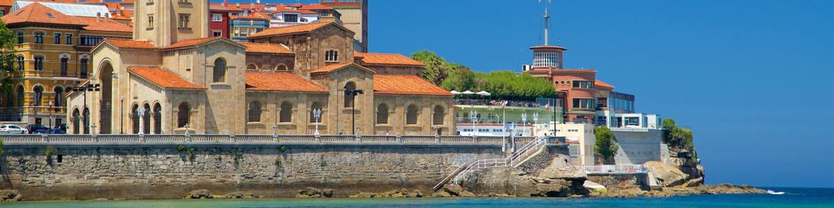 Plage de San Lorenzo mettant en vedette vues littorales et ville côtière