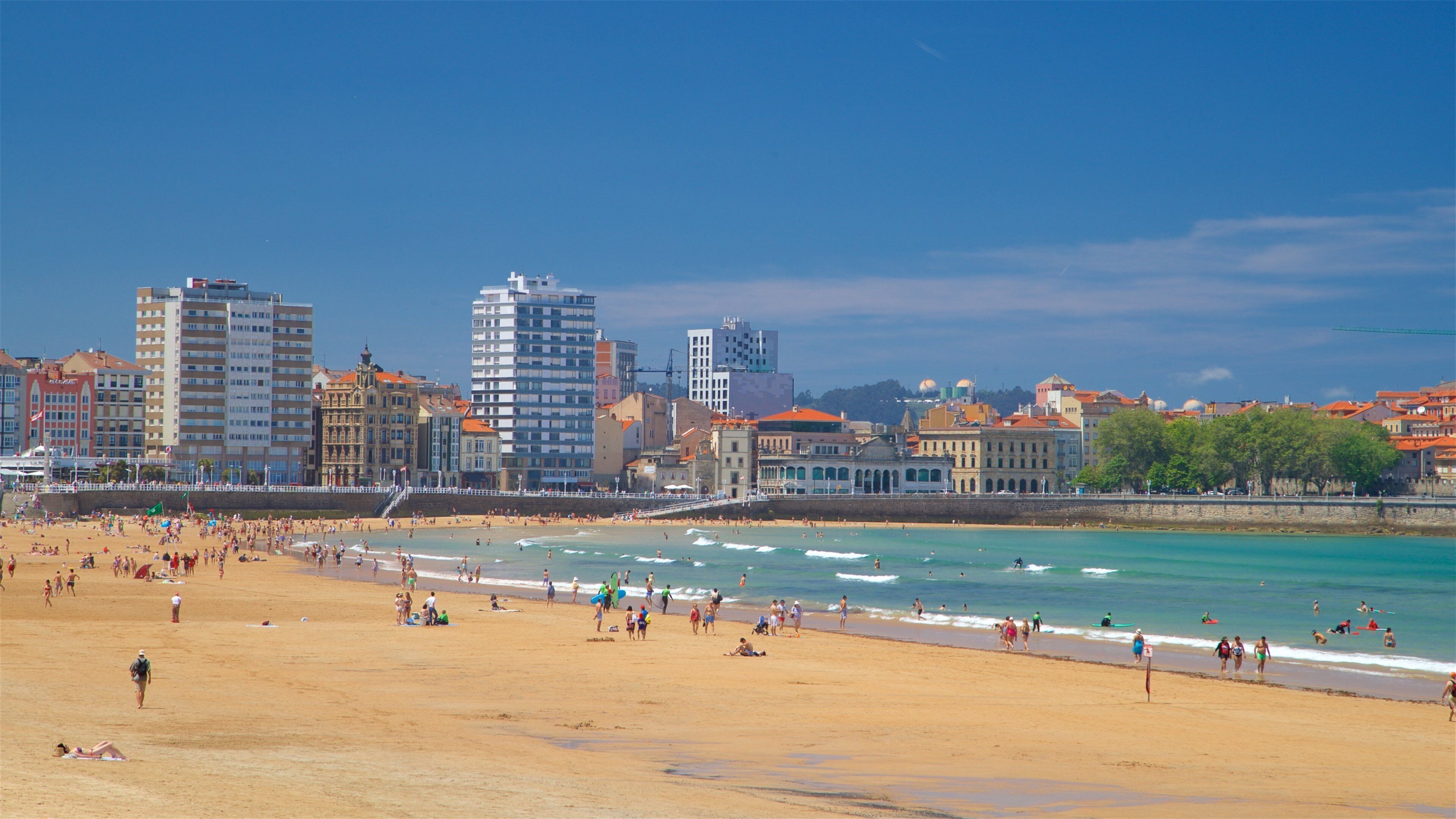 San Lorenzo Beach which includes general coastal views, a coastal town and a sandy beach