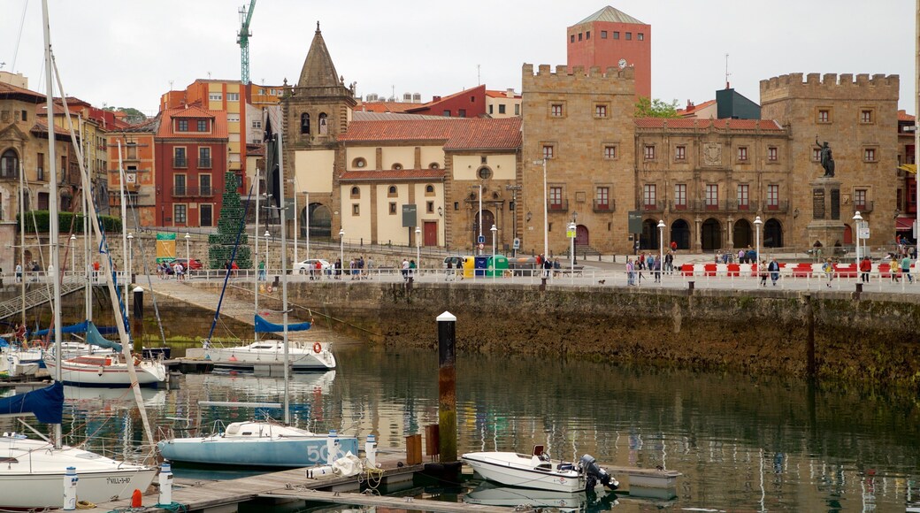 Palacio de Revillagigedo which includes a city, a bay or harbour and heritage elements