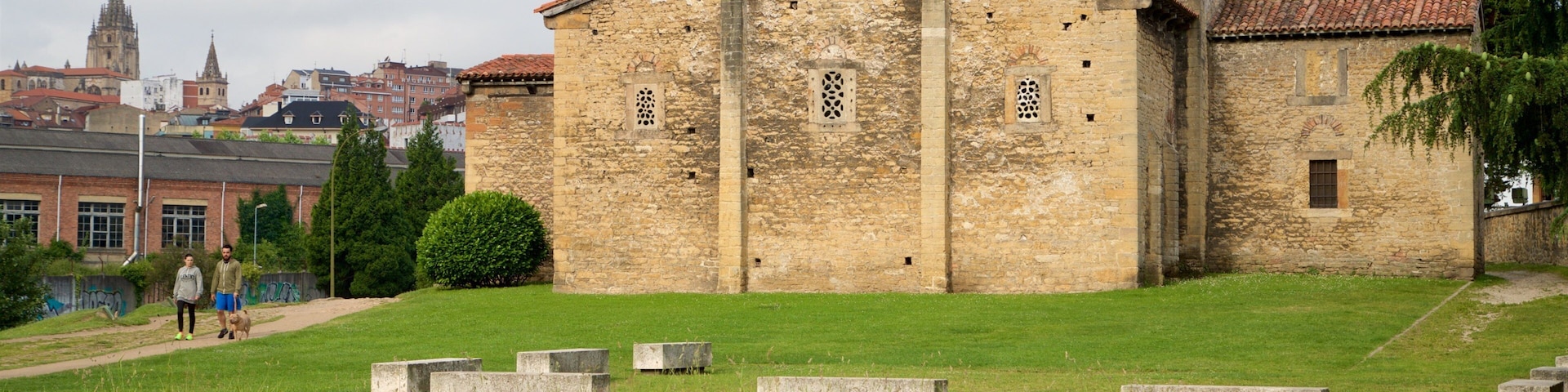 San Julian de los Prados which includes heritage architecture, hiking or walking and a city