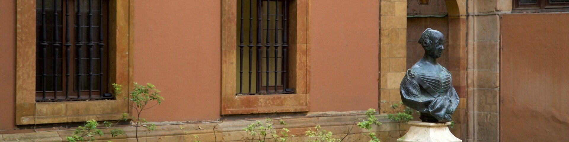 University of Oviedo which includes a statue or sculpture
