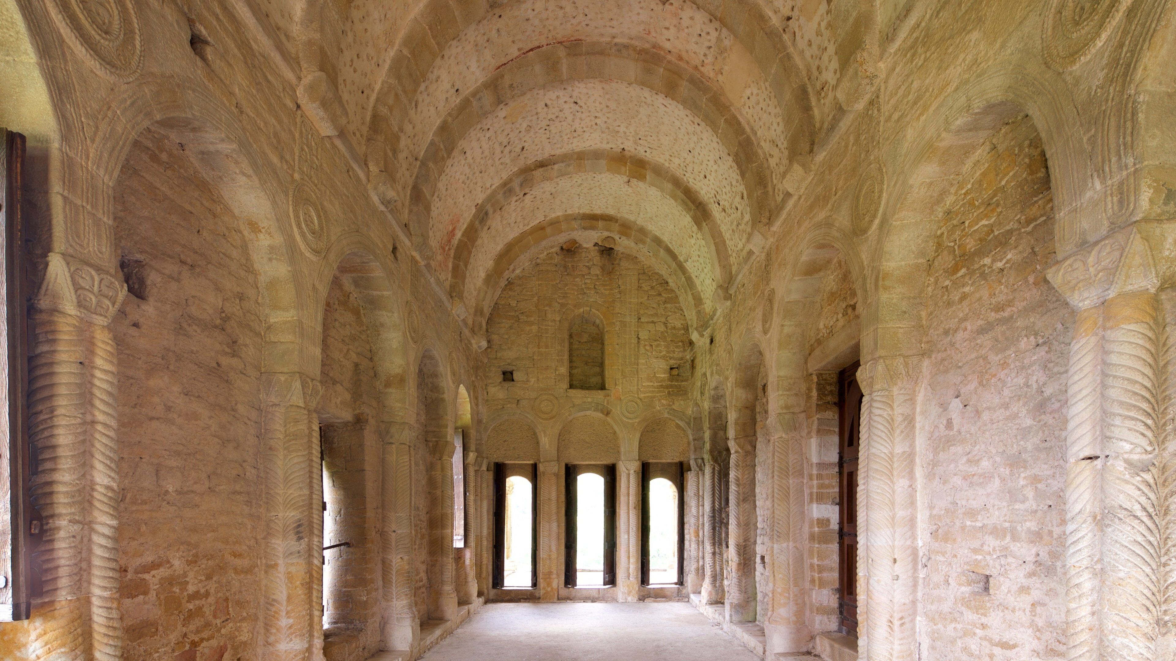Santa Maria del Naranco featuring interior views and heritage elements
