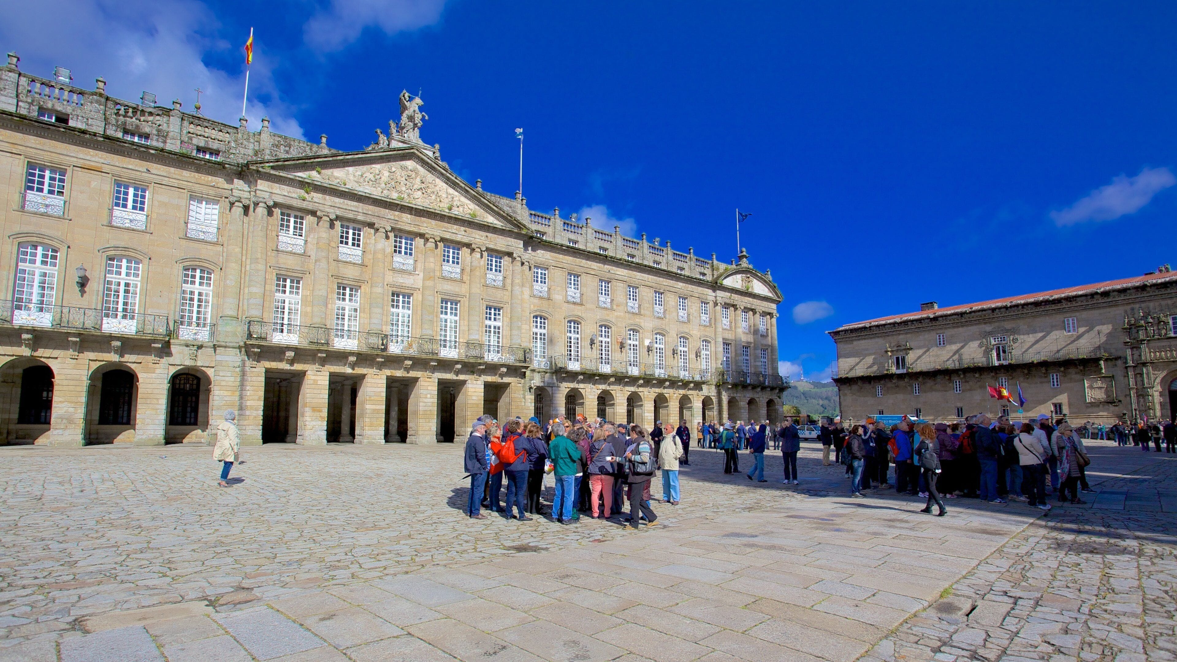 Obradoiro Square which includes heritage architecture, a square or plaza and street scenes