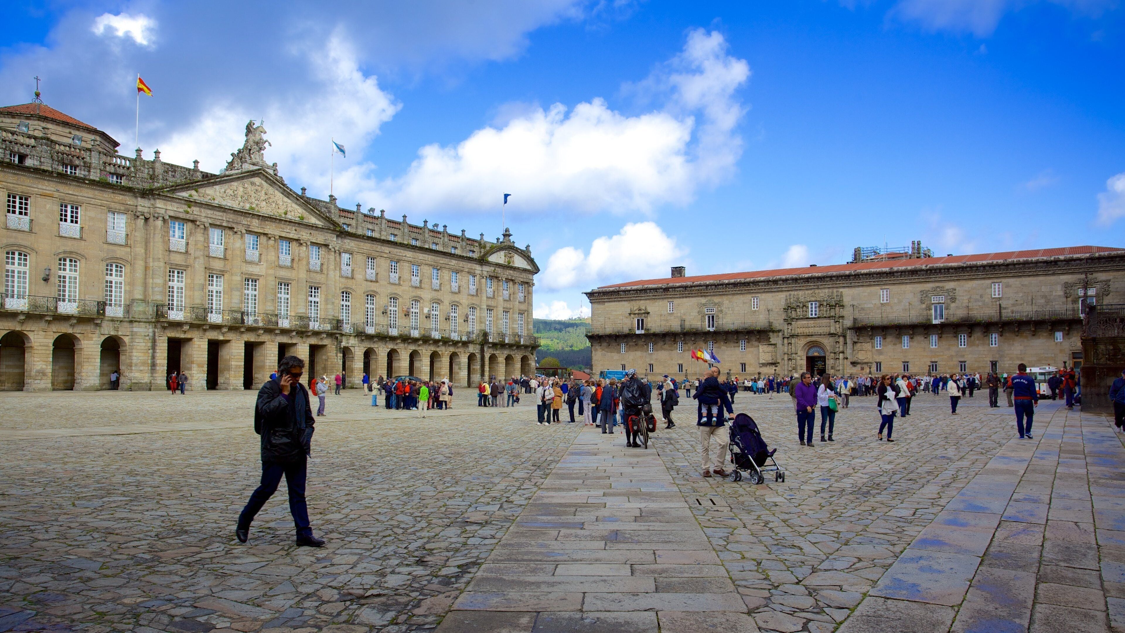 Obradoiro Square showing a square or plaza, heritage architecture and signage