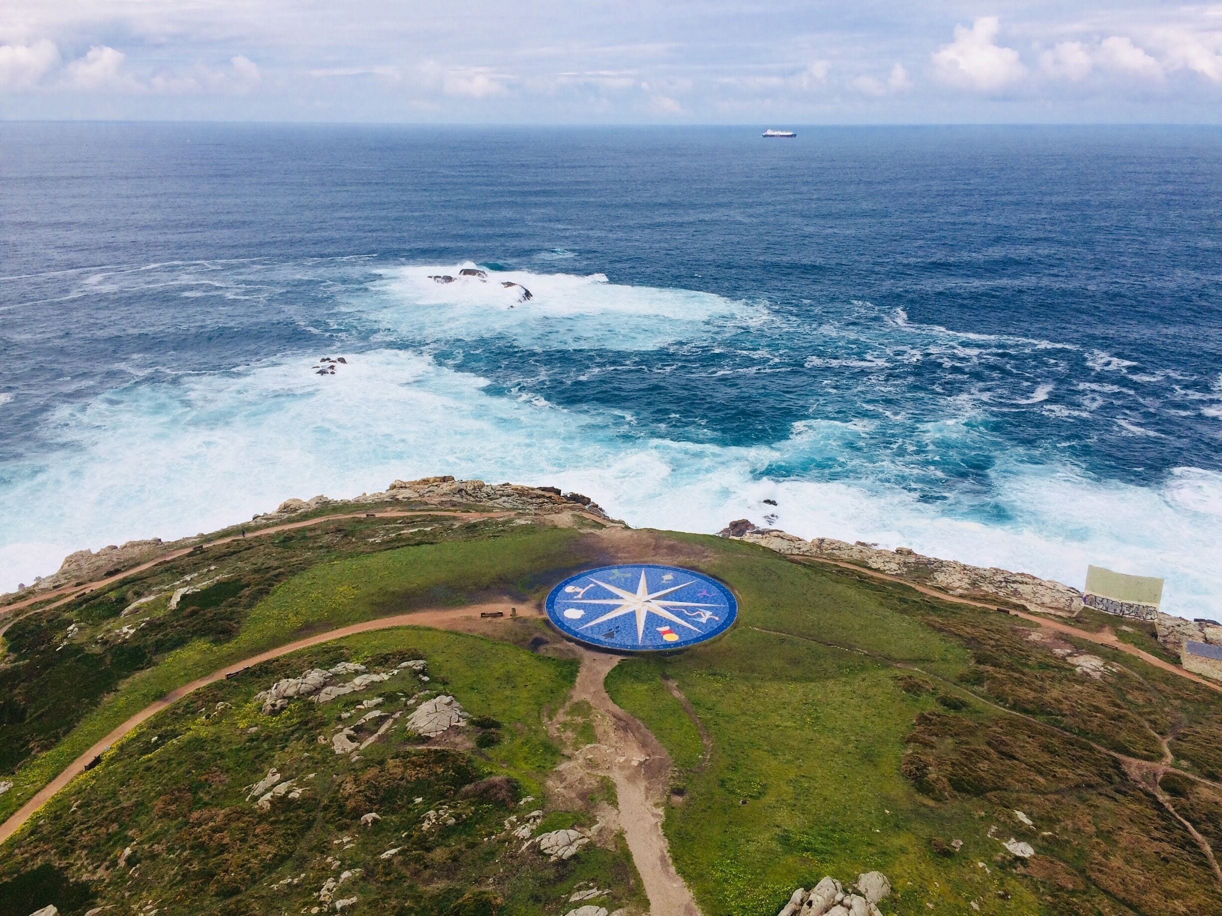 The large compass and the Bay of Biscay/Atlantic Ocean viewed from up the Tower of Hercules in A Coruña.
