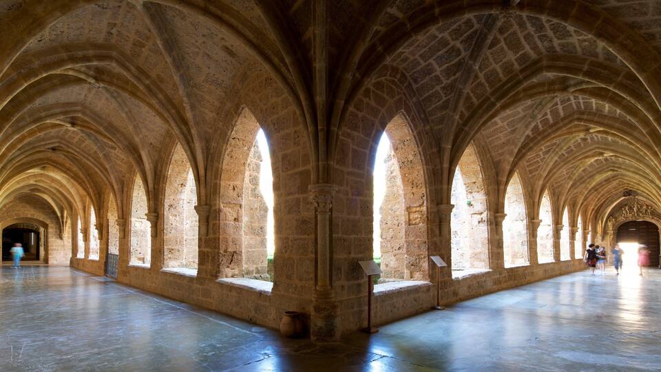 A cathedral with a series of arches and a long nave.